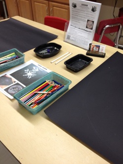 Set up for Handalas: Black Paper and Colored Pencils